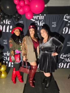 Naima Chambers, Clenesha (CT) Montgomery, and Sornsawan (Sonee) Kulaga Wilson — Co-Executive Directors of the Tri-Cities Diversity & Inclusion Council — standing together at Lovin Me 911 Event, smiling warmly to mark the start of their shared leadership.